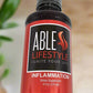 ABLE Inflammation Elixir with kitchen background